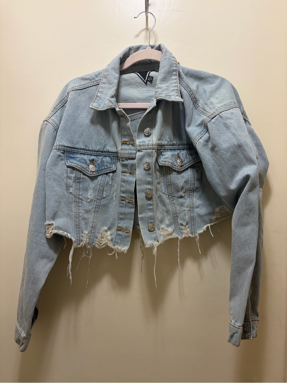 Cropped Light Wash Distressed Denim Jacket